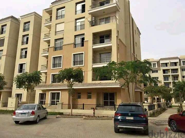 Ground floor apartment with garden for sale in front of Madinaty, 990,000 down payment  in Saray new cairo 6