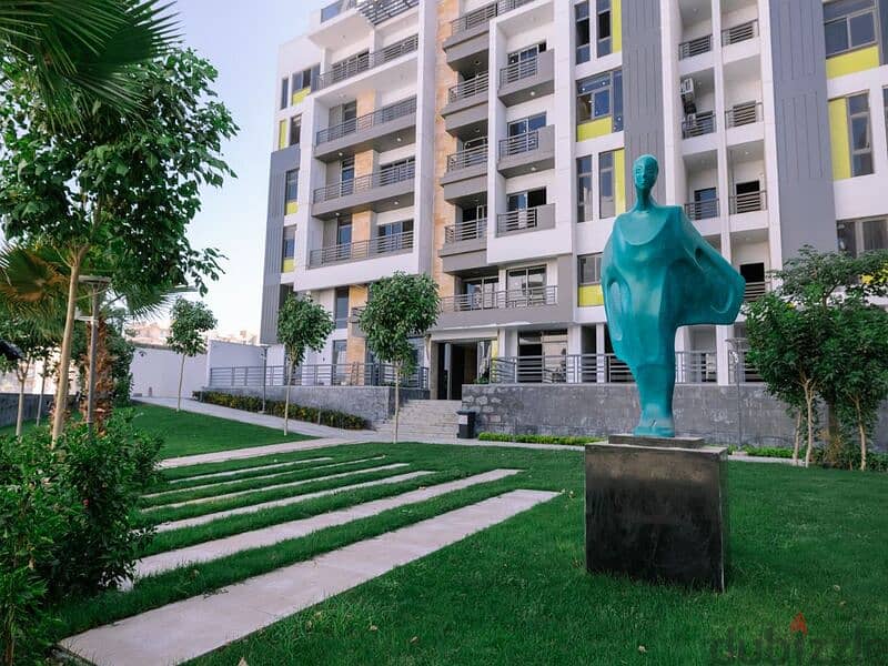 With a 15% down payment, own an apartment with a private garden area with equal installments in Golden Square - Icon 3