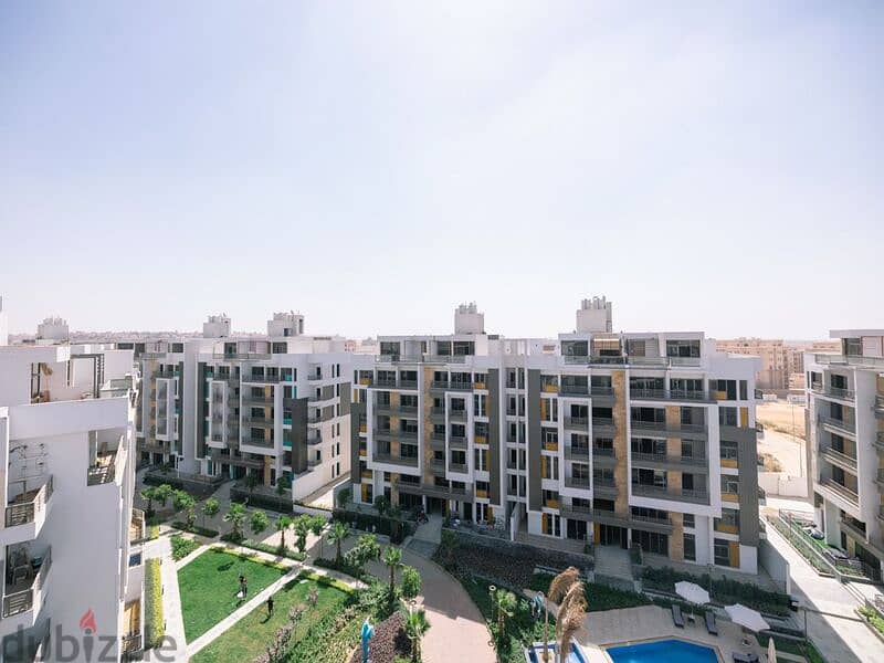 With a 15% down payment, own an apartment with a private garden area with equal installments in Golden Square - Icon 8