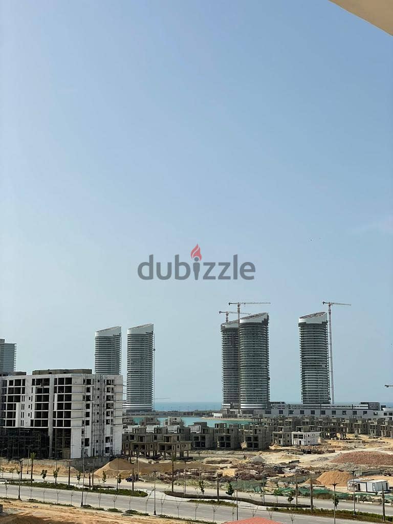 Apartment 238 sqm finished, immediate receipt in Mazarine with a view of the sea and the Crystal Inn Hotel in front of the El Alamein Towers 7