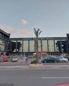 Shop for sale, 130 sqm, immediate receipt, ground floor in the most famous mall in Shorouk, in front of Green Hills Club and next to the gate of Dar M