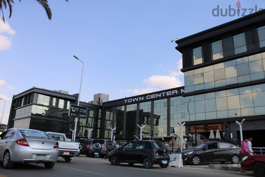 Shop for sale, 130 sqm, immediate receipt, ground floor in the most famous mall in Shorouk, in front of Green Hills Club and next to the gate of Dar M 8