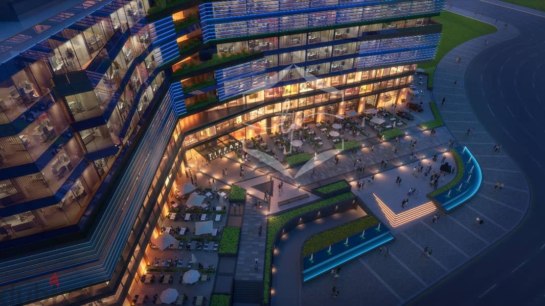135 meters retail store, main facade on the plaza, 3200 meters, Sports City, Al Amal Axis, and in front of the main entrance to the mall 11