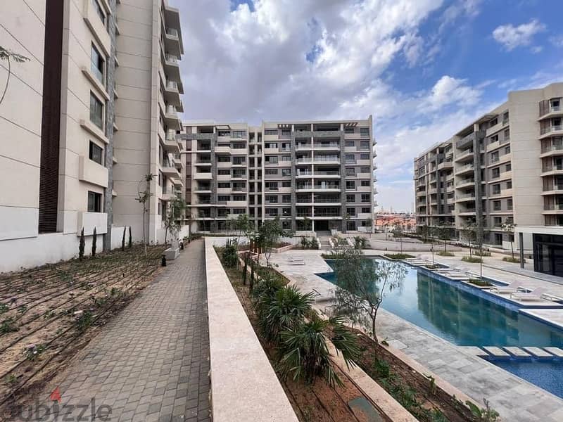 apartment+garden 126m for sale in new Capital, R7 in il Bosco Compound شقة ارضي بجاردن 126متر للبيع في العاصمة الادارية R7 في كمبوند البوسكو 10
