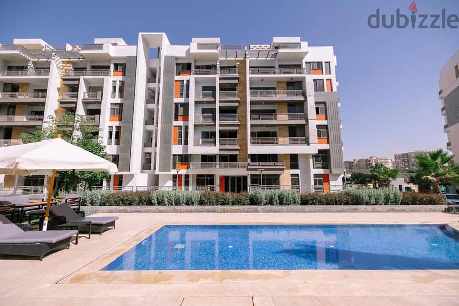 Penthouses villa for sale in Icon Compound new cairo view on swimming pool,with installment 1