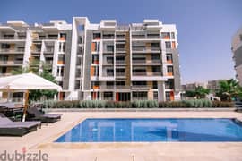 Apartment in The Icon Compound the price includes garage and club in the new cairo 0