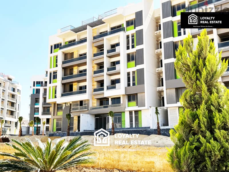 Apartment the icon compound new Cairo with down payment and installments including club and garage 2