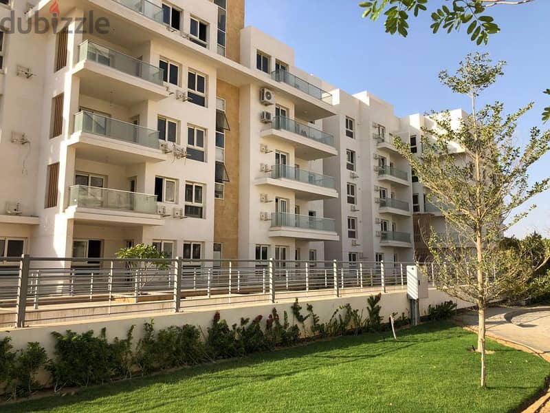 Ground floor apartment with garden for sale in installments in Mountain View iCity October Compound 2