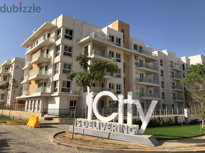 Ground floor apartment with garden for sale in installments in Mountain View iCity October Compound 4