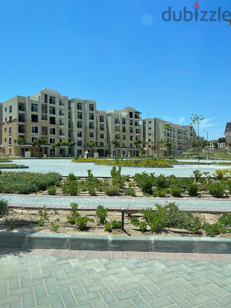 Apartment for sale sarai compound ready to move with installments and private garden 104 meters 2