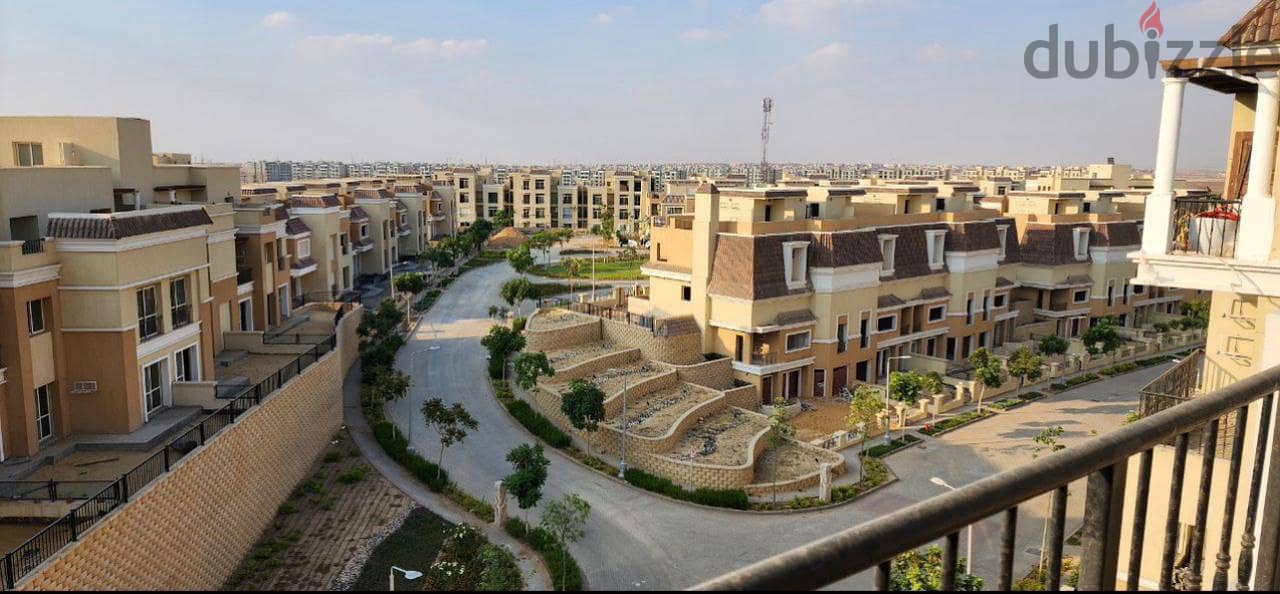 Apartment for sale sarai compound ready to move with installments and private garden 104 meters 18