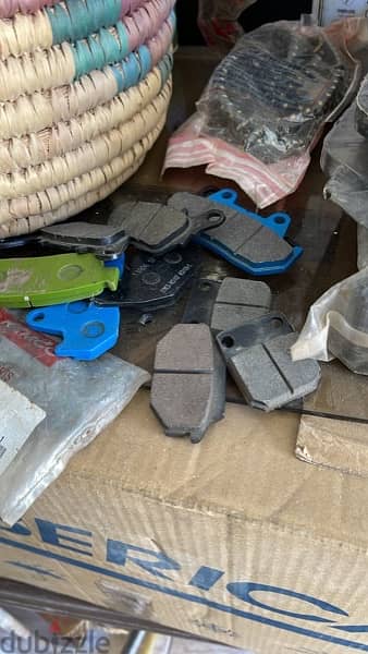 new kymco brake pads , air filters , oil filters ,safety knees 5