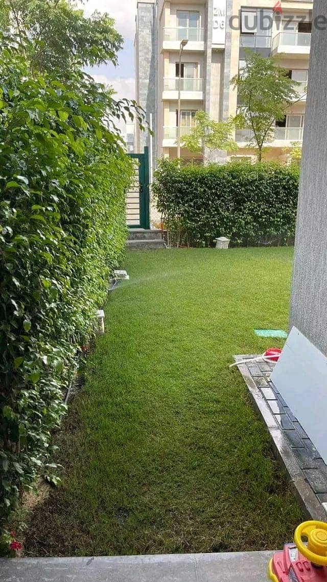 Apartment with garden for sale, immediate receipt, fully finished, at a very special price in the Galleria New Cairo 2