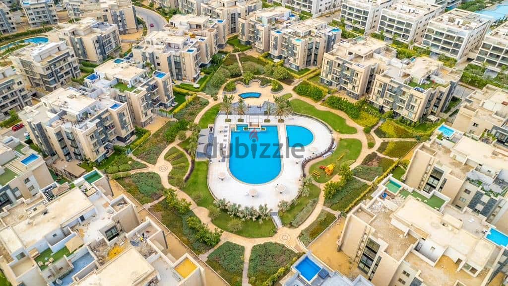 Apartment with garden for sale, immediate receipt in installments, in Galleria Compound in Fifth Settlement 6
