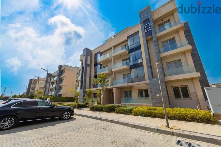 Apartment with garden for sale, immediate receipt in installments, in Galleria Compound in Fifth Settlement 8