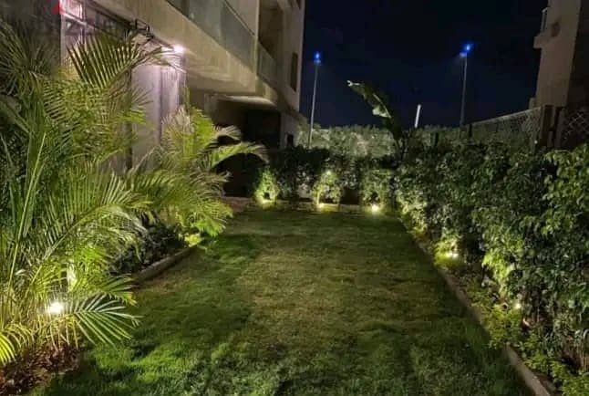 Apartment with garden for sale, immediate receipt in installments, in Galleria Compound in Fifth Settlement 9