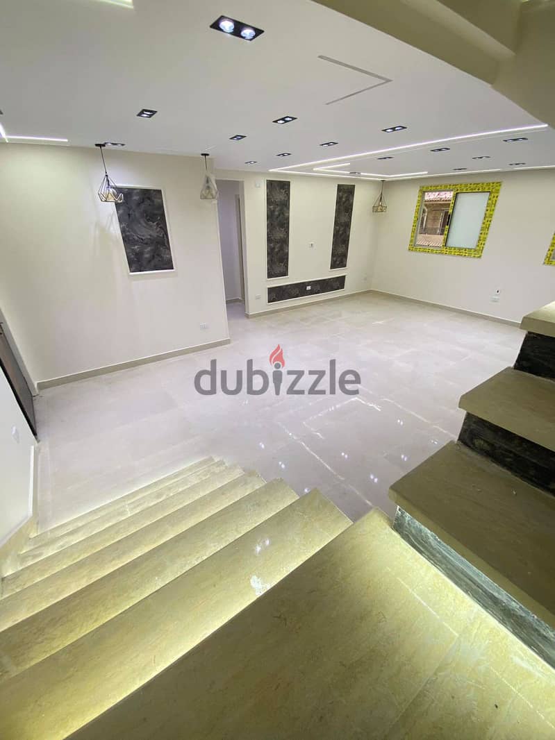 Duplex for sale, ultra super luxury finishing, in Al-Fardous, in front of Dreamland, 6 October 2
