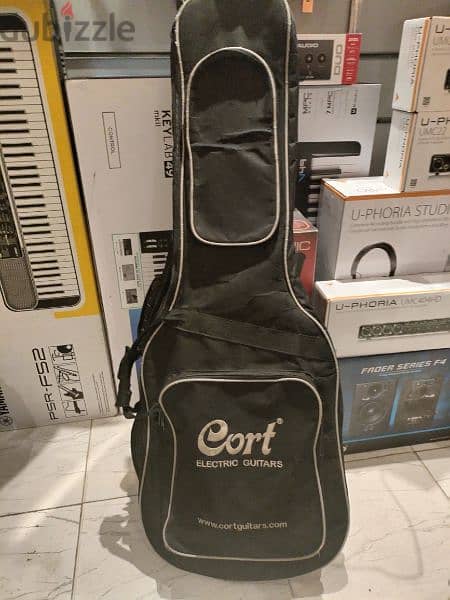cort g100 guitar with bag and strap 2