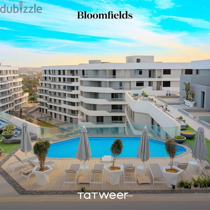160 sqm double-view corner apartment with a distinctive view of the lakes on an area of 10 acres in Bloom Fields Compound, New Cairo, Mostakbal City 16