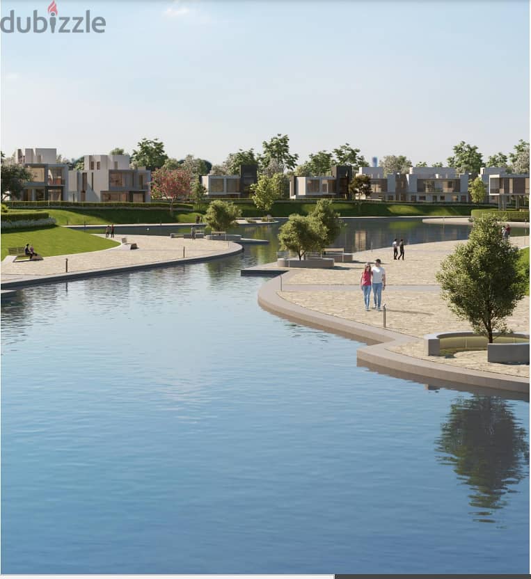Garden villa on the lagoon in Vinci Compound with a 15% discount and 8 years installments in front of the Mega Mall 2