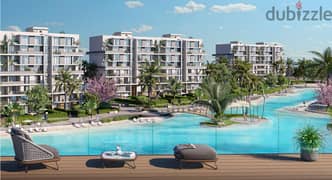 With a 15% discount, an apartment in a garden for sale on the Lagoon, in installments over 8 years, in front of the Mega Mall