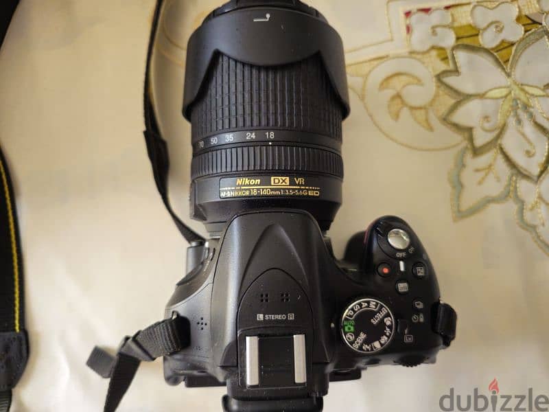 nikon d5200 with 18/140 lens used like new 5