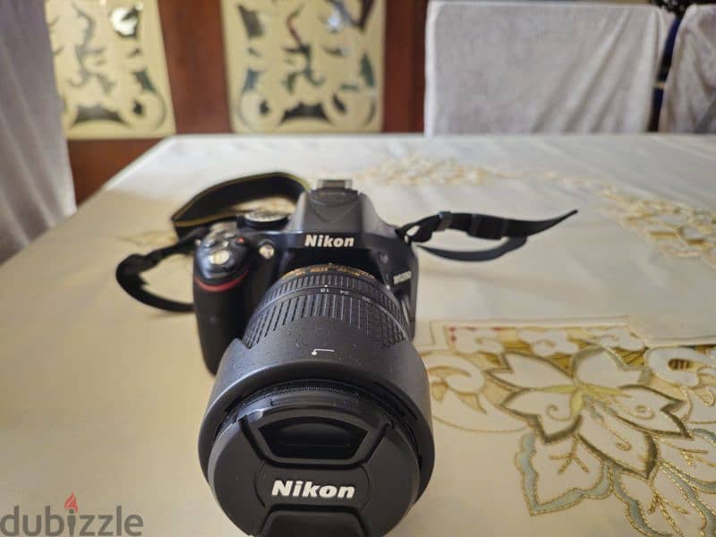 nikon d5200 with 18/140 lens used like new 7