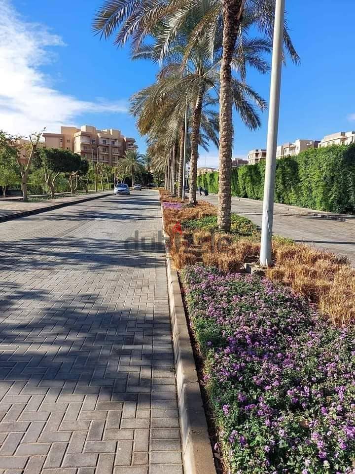 Apartment with private garden for sale with a down payment of 524 thousand in 6th of October 2