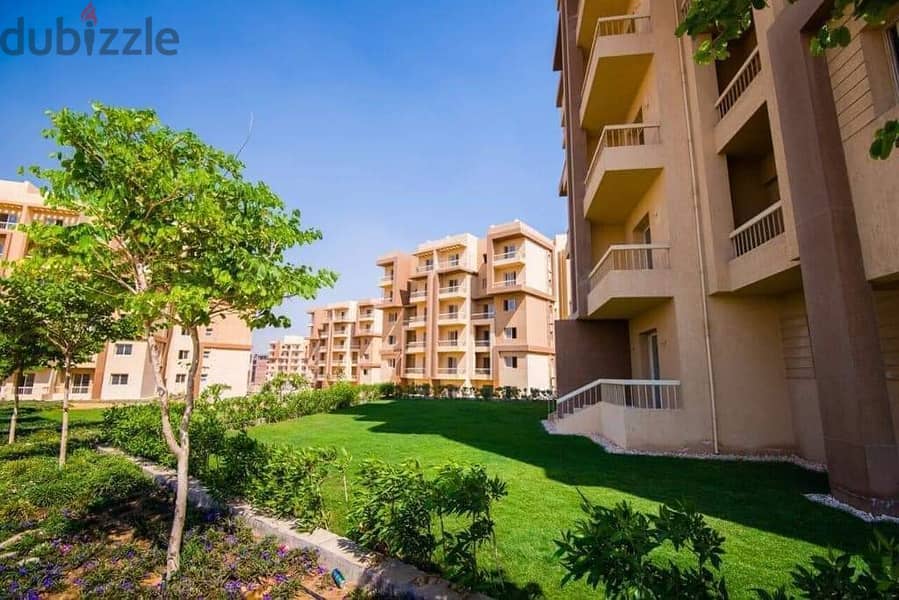Apartment with private garden for sale with a down payment of 524 thousand in 6th of October 9