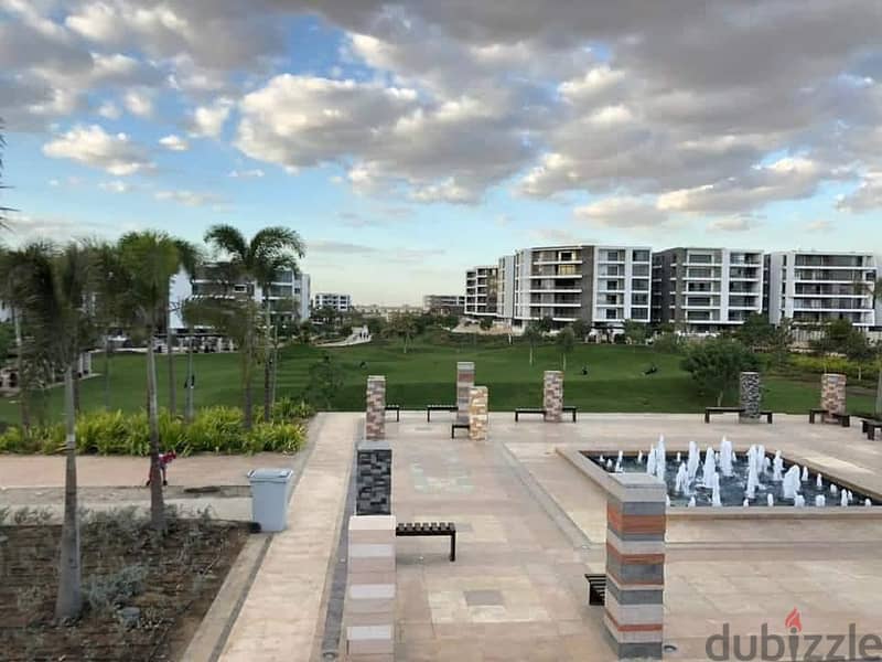 Luxury apartment for sale in installments on a very special view on the landscape in front of Cairo Airport in the Taj City compound 2