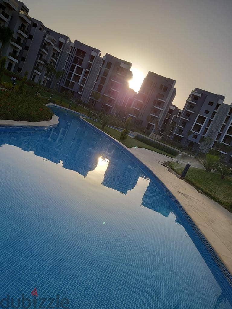 An opportunity to live immediately with a 10% down payment in an apartment in a view garden in Sun Capital Compound 8