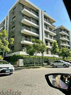 A luxury apartment for sale in installments in a very special location, with a landscape in the Taj City Compound, in front of Cairo International Air 0