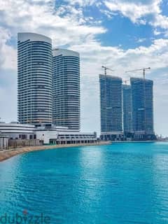 Apartment for sale, fully finished, Super Lux, in Al Alamein Towers, with panoramic sea view, in installments over 7 years