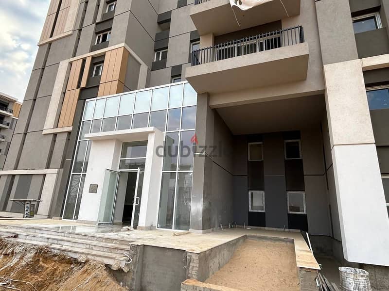 Apartment for sale with private garden in haptown compound  mostakbal city 4