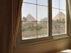 Apartment (immediate delivery) in installments in 6th of October, view of the pyramids