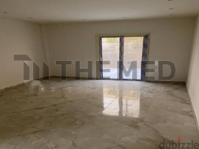 Apartment for sale, ground floor, with garden, prime location, in the Ninth District, Sheikh Zayed 3
