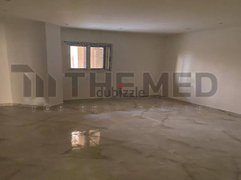 Apartment for sale, ground floor, with garden, prime location, in the Ninth District, Sheikh Zayed 5