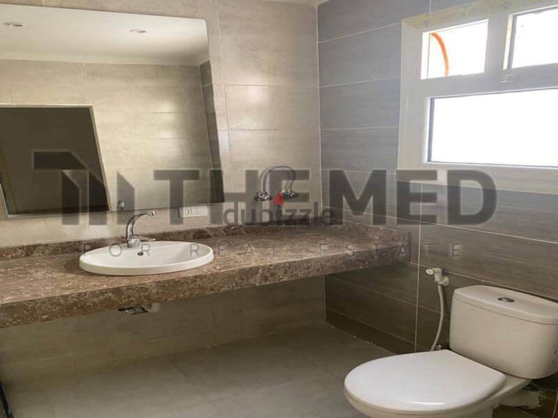 Apartment for sale, ground floor, with garden, prime location, in the Ninth District, Sheikh Zayed 11