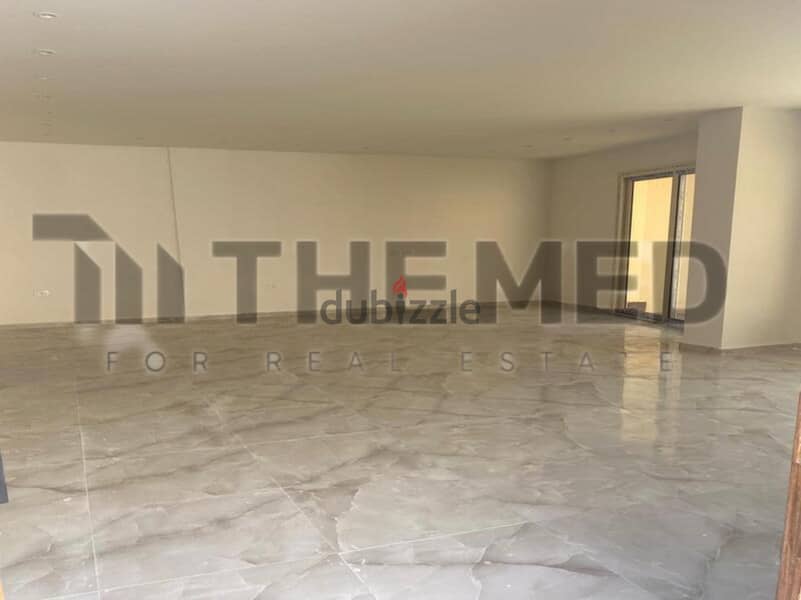 Apartment for sale, ground floor, with garden, prime location, in the Ninth District, Sheikh Zayed 12