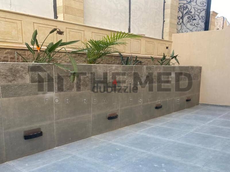 Apartment for sale, ground floor, with garden, prime location, in the Ninth District, Sheikh Zayed 13