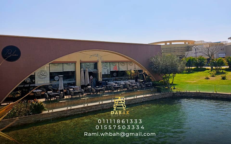 Shop for sale in Open Air Mall, Madinaty, 26 sqm, ground floor, facing a view of the lakes Shop for sale in Open Air Mall, Madinaty 3
