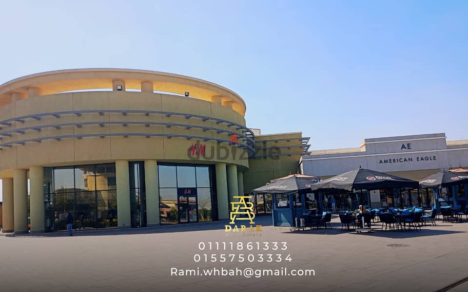 Shop for sale in Open Air Mall, Madinaty, 26 sqm, ground floor, facing a view of the lakes Shop for sale in Open Air Mall, Madinaty 14