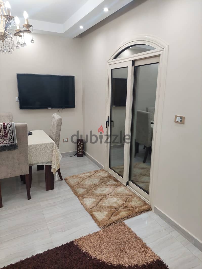 Apartment in 6th of October, Al Nasr Compound, at a burnt price, super luxury 4