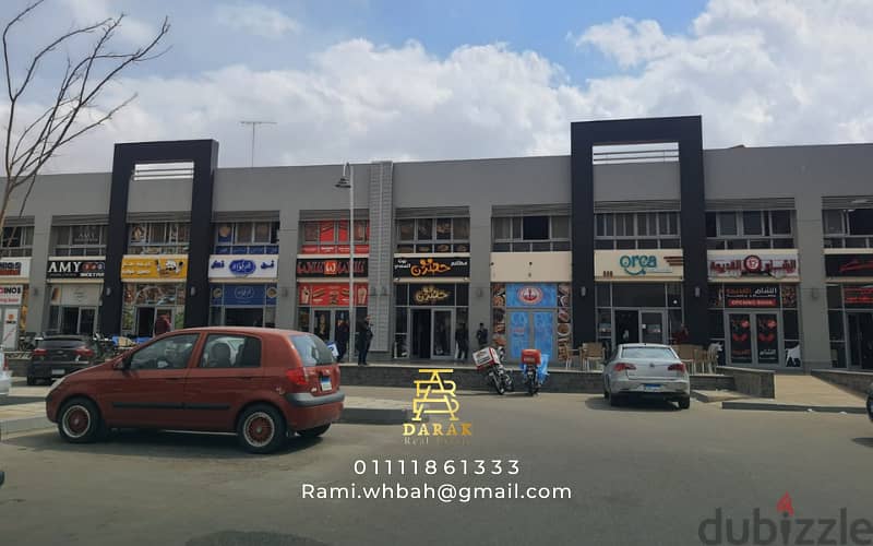 Shop for sale, 76 sqm, rented, first blocks in the Craft Zone, Madinaty, at the entrance to the market and the entrance to East Hub 5