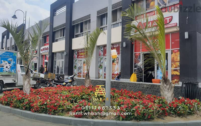 Shop for sale, 76 sqm, rented, first blocks in the Craft Zone, Madinaty, at the entrance to the market and the entrance to East Hub 7
