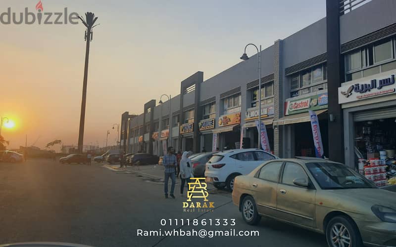Shop for sale, 76 sqm, rented, first blocks in the Craft Zone, Madinaty, at the entrance to the market and the entrance to East Hub 16