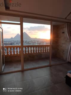 A luxury apartment for sale with a fabulous view of the pyramids, ready for immediate receipt, in the Sun Capital Compound, full of services