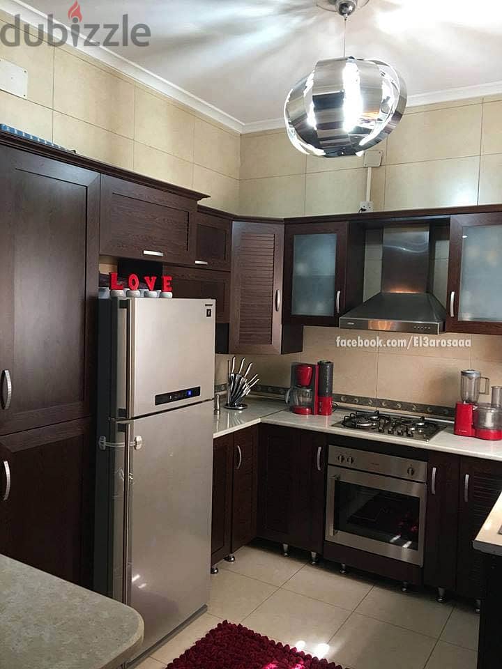 A 3-bedroom apartment in a compound in New Cairo on a landscaped land and lagoons . 5