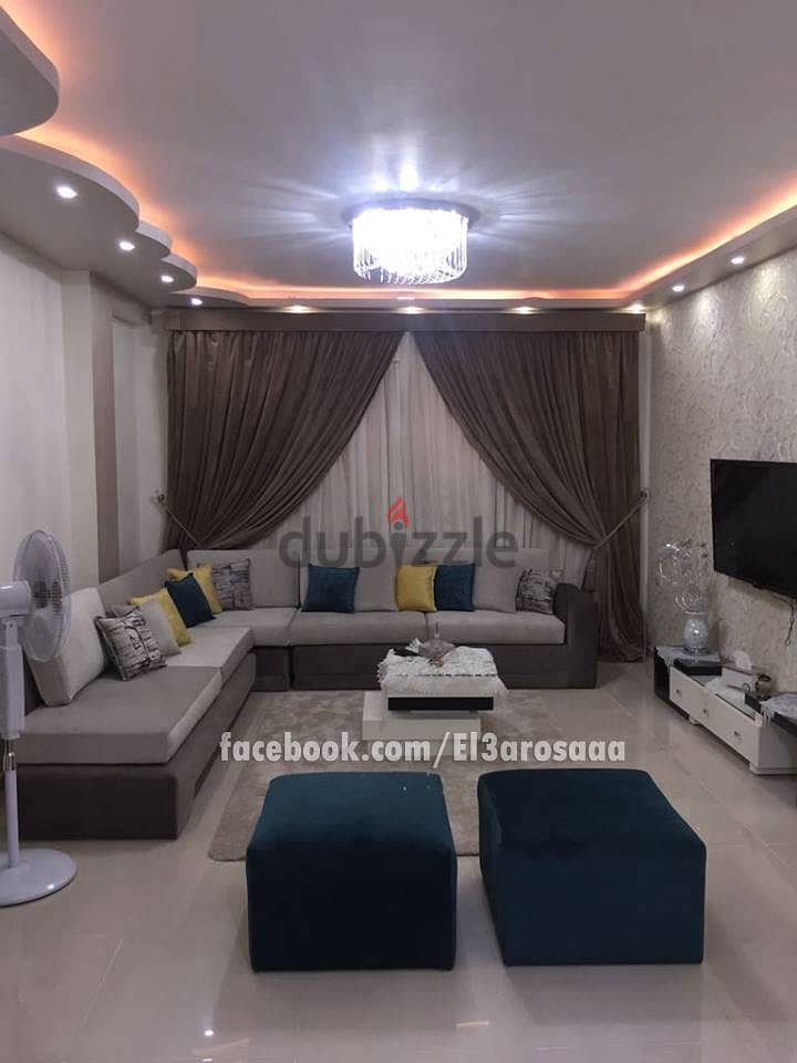 A 3-bedroom apartment in a compound in New Cairo on a landscaped land and lagoons . 6