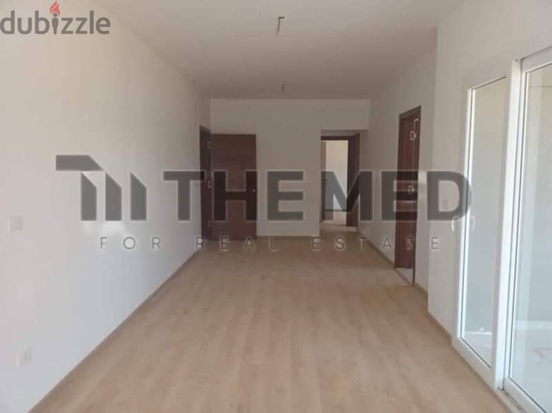 Apartment for sale, ground floor with garden, in Kayan Compound - 6th of October 3